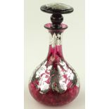 A Laugharne mottled ruby glass decanter with hallm