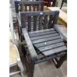 Pair of weathered hardwood slatted garden chairs.