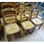 A set of 6 French oak ladder back and rush seated