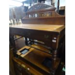 A late Victorian mahogany hall table with raised c