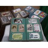 3 Albums containing over 700 Vintage postcards.