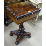 A Regency rosewood sewing box, on carved centre co