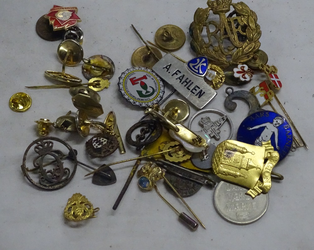 Assorted enamel and other badges.