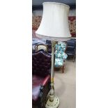 A cream painted and gilded fluted standard lamp an