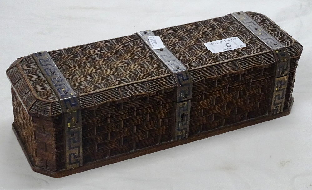 A continental carved wood basket weave design glov