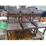 A set of 6 French tooled leather upholstered dinin