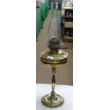 An Edwardian brass oil lamp.