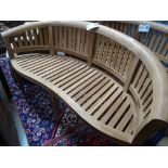 A new Indonesian hardwood bow back garden bench.