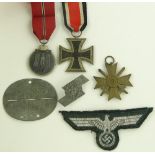 A group of German Third Reich medals, cloth badge,