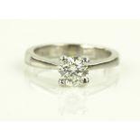 A 0.7ct 18ct white gold solitaire diamond ring, cl