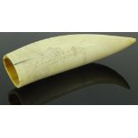 An Antique Scrimshaw whale tooth with lighthouse a