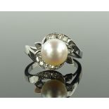 An 18ct white gold whole Akoya pearl set ring, with diam