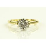 A 0.8ct solitaire diamond ring, 18ct gold settings