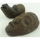 2 African carved wood tribal masks.