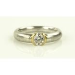 A 0.4ct solitaire diamond ring, heavy unmarked pla