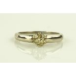 A 0.5ct fancy yellow solitaire diamond ring, unmar