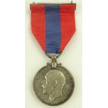 A George V medal for Faithful Service, leather cas