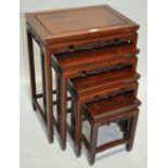 A nest of 4 Chinese rosewood occasional tables, la