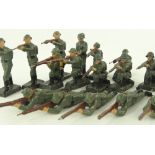 A set of composition 2nd war period German soldiers with rifles.