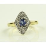 An 18ct gold sapphire and diamond set lozenge pane