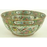 A Chinese Famille Rose bowl, hand painted and gild