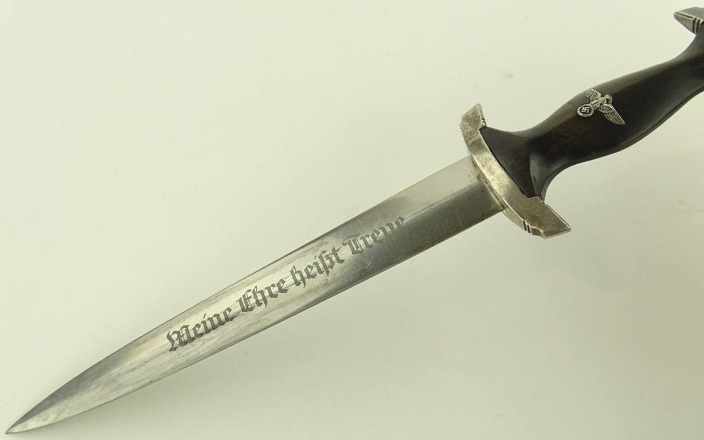 A German Third Reich SS dagger, blade etched with