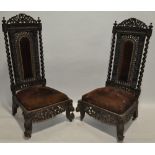 A pair of 19th century Burmese hardwood low chairs