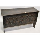 A 17th/18th century oak coffer of plank constructi