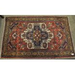 A Caucasian blue and red ground handmade rug, 5'3"