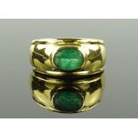 A Portuguese unmarked gold emerald set ring, emera