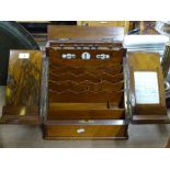 A Victorian mahogany desk top stationery rack with