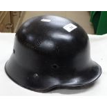 A German Second World War helmet.