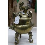 An Oriental incense burner with dog of fo knop.