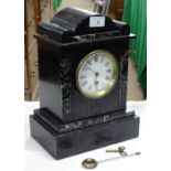 A slate cased mantel clock.