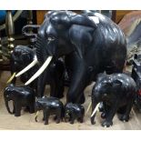 6 Carved ebony elephants.