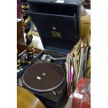 A HMV portable gramophone and records.