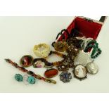 A box of various costume jewellery.