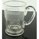 An Antique glass tankard, facet-cut body with whee