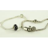 2 Silver Pandora bracelets with 4 charms.