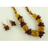 An amber bead necklace together with a matching pa