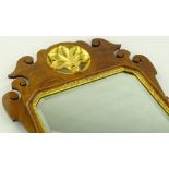 A Georgian style walnut framed wall mirror with ca