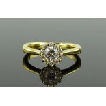 A modern 18ct gold diamond cluster ring, setting 7