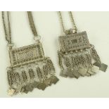 2 Ornate Omani silver Koran necklaces.