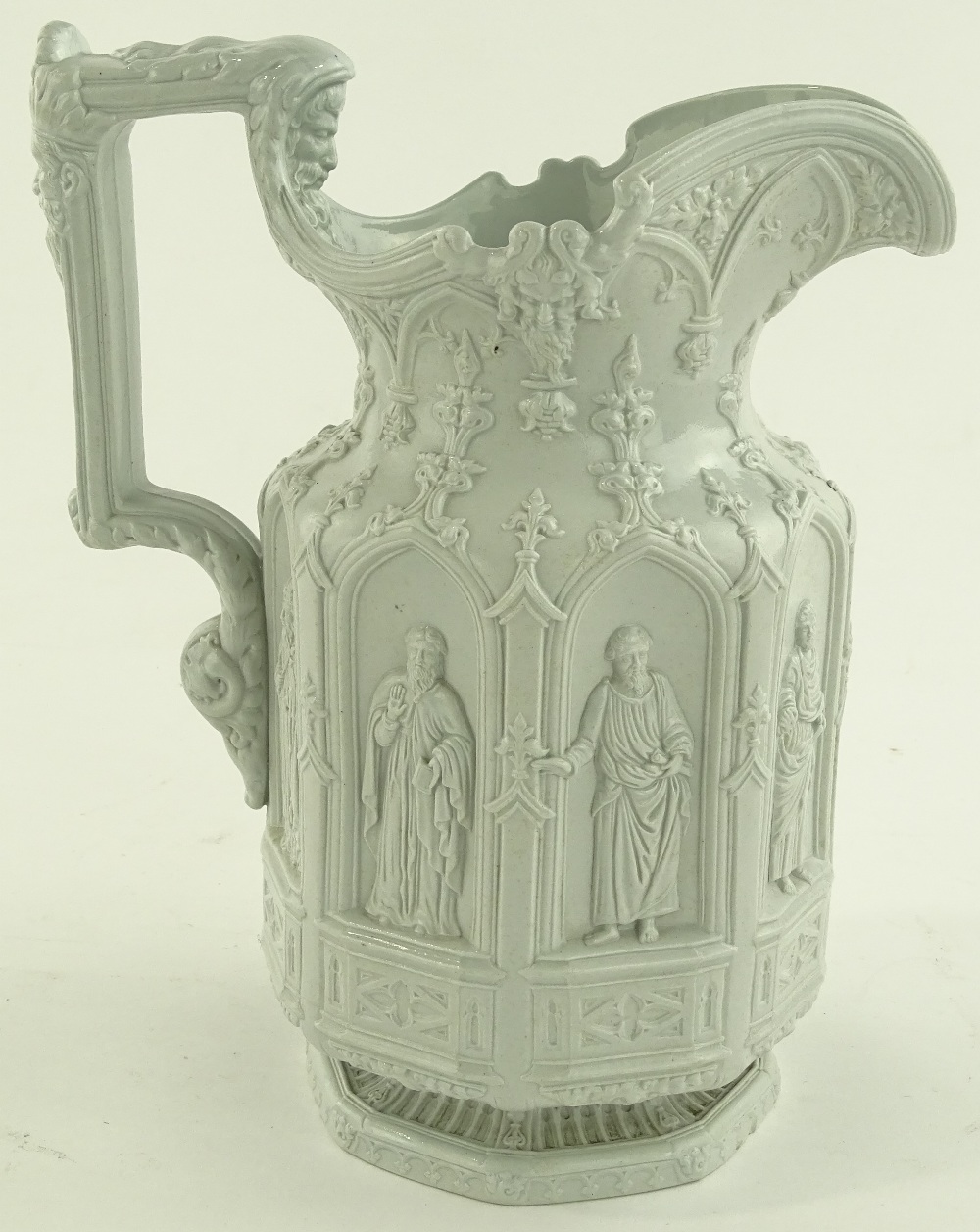 A Charles Meigh pottery jug, relief embossed panel
