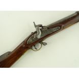An Antique percussion carbine rifle, brass trigger