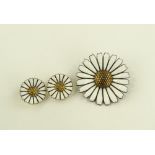 A Danish sterling silver and white enamel daisy pa