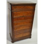 A 19th century French walnut tall chest of 7 drawe