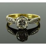 An 18ct gold solitaire diamond ring, central diamo