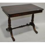 A William IV rosewood 2-drawer writing table with