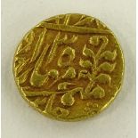 An early Middle Eastern gold coin, tests as high c
